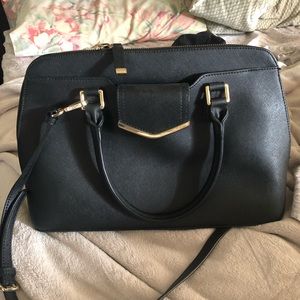 Calvin Klein gold and black leather purse